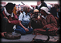 American traveler, Marjory Day with snake charmer, Blaid Farrouss at the public square of Marrakech