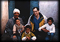 Film maker, Steve Montgomery, with snake charmer, Blaid Farrouss and family in Marrakech, Morocco. Photo by
Adil Bicane